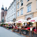 Ogródek restauracyjny Rynek Główny Kraków. Zdjęcie reklamowe kraków